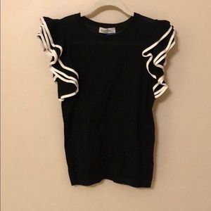 Black shirt with ruffled sleeves